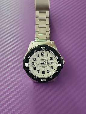 Casio Silver Watch with Black Bezel and White Dial